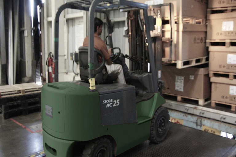 student driving a fork lift